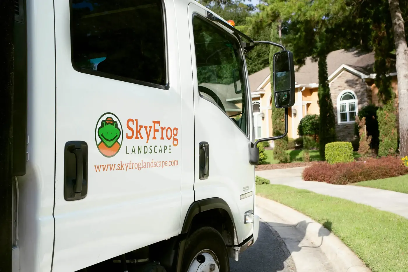 SkyFrog Landscape truck parked in a neighborhood
